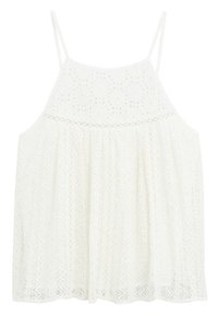 Débardeur en dentelle blanche avec fines bretelles, présentant des motifs géométriques délicats, une coupe ample et un corsage texturé.