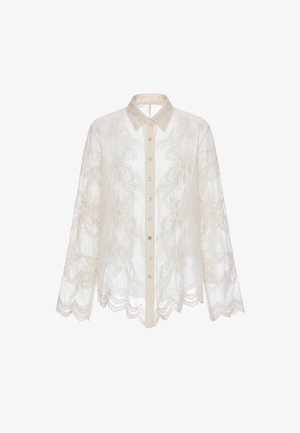 Weiße transparente Bluse mit langen Ärmeln, Blumenstickerei, geschwungenem Saum und Knopfleiste vorne mit klassischem Kragen.