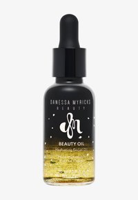 Svart glassdråperflaske med en gradient fra svart til gull, med hvit tekst og logo. Kapasitet på 30 mL med fuktighetsgivende ansiktsolje.