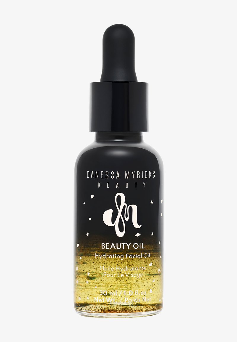 Svart glassdråperflaske med en gradient fra svart til gull, med hvit tekst og logo. Kapasitet på 30 mL med fuktighetsgivende ansiktsolje.