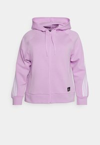 Sweat à capuche violet zippé en tissu doux. Comprend une capuche, des cordons de serrage et des rayures blanches verticales sur les manches. Inclut un petit logo.