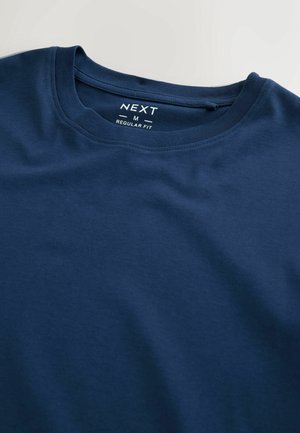 Marineblå kortærmet T-shirt lavet af glat bomuld med rund hals, mærket "NEXT," størrelse M, normal pasform.