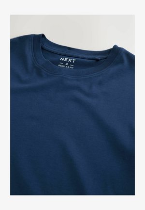 Navy zils īsām piedurknēm T-krekls, izgatavots no gluda kokvilnas, ar apaļu kakla izgriezumu, marķēts ar "NEXT", izmērs M, parasts piegriezums.