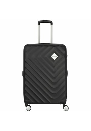 Black hard-shell suitcase with a chevron pattern, silver handle, and wheels. Features a diamond logo accent and zipper closure.