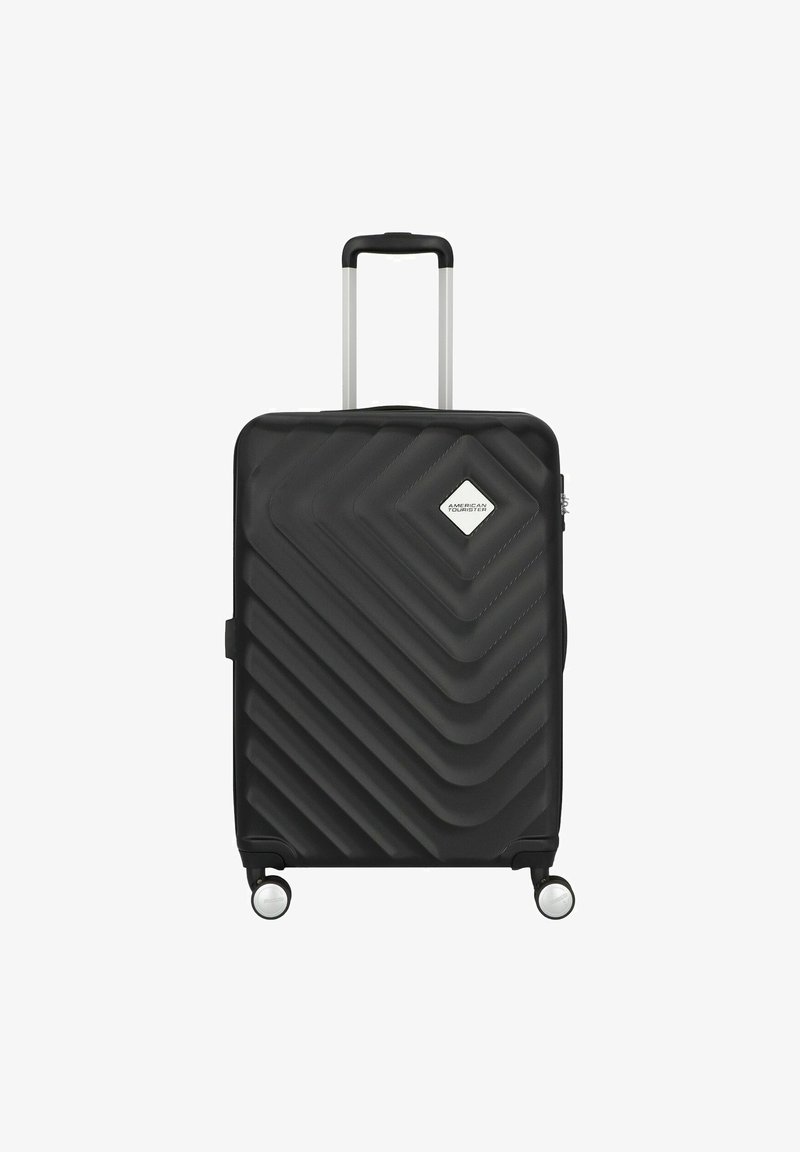 Valigia rigida nera con motivo a zigzag, manico argentato e ruote. Presenta un accento con logo a forma di diamante e chiusura a zip.