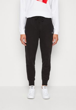 Calvin Klein Jeans MICRO MONOLOGO HWK - Pantaloni sportivi - black