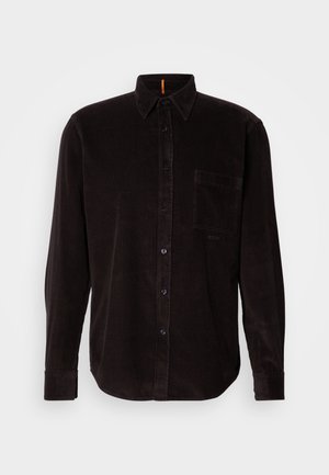 Dark brown corduroy shirt with a button front, point collar, long sleeves, single chest pocket, and textured ridged pattern.