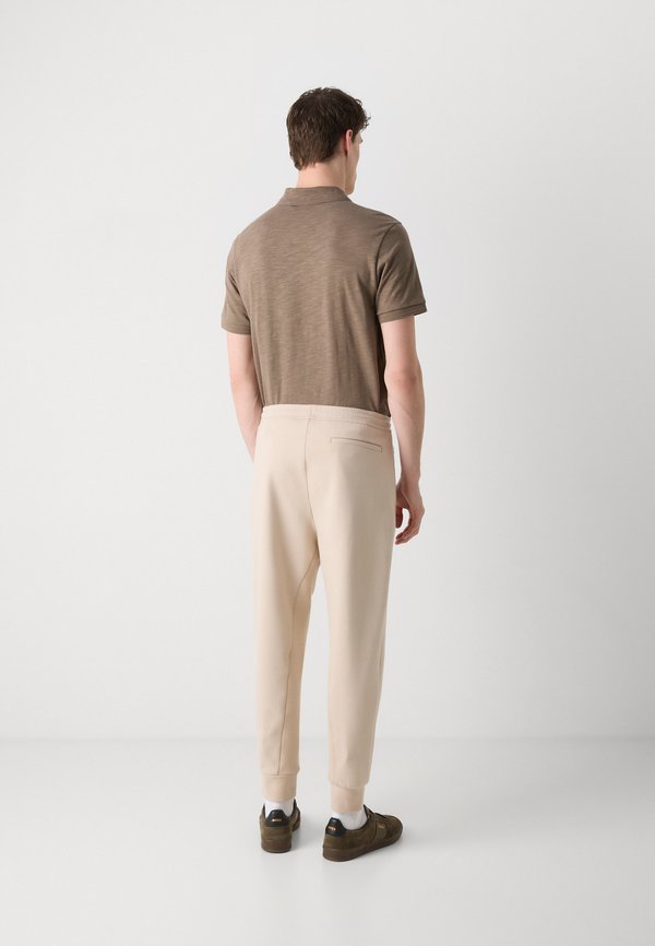 HADIKO  - Tracksuit bottoms - open beige4