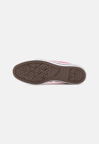Pink canvas sneaker with a white rubber sole. The outsole features a geometric tread pattern and "All Star" branding.