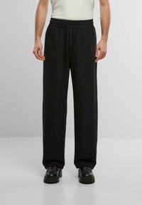 LOGO - Pantaloni de trening - black