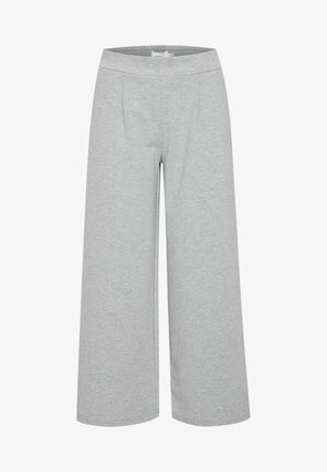 Valkoiset leveälahkeiset housut vaaleasta harmaasta kankaasta, jossa on sileä rakenne, joustava vyötärö ja kaksi etupleffaa lisädetailina.