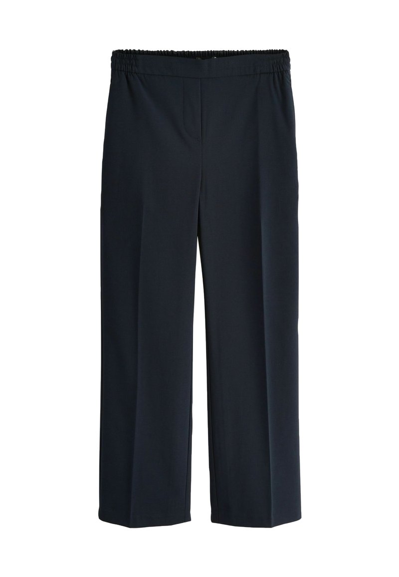 Pantalons larges bleu marine avec une taille élastique, dotés de poches avant et d'une texture lisse, conçus pour le confort et la facilité d'utilisation.