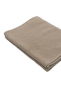 Beżowa, teksturowana tkanina, prostokątny kształt, złożona z widocznym ściegiem wzdłuż krawędzi, prezentująca wzór tkany.