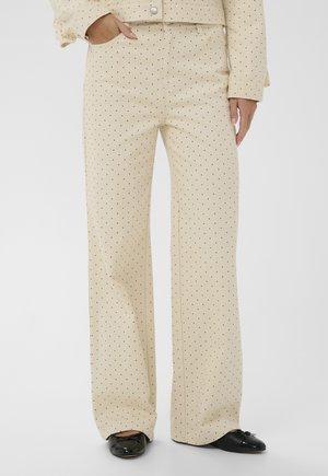 - Jeansy Relaxed Fit