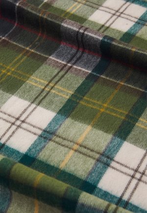 Soft wool fabric with green, white, yellow, and blue plaid pattern, shown in close-up with visible texture and folded areas.