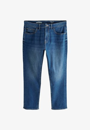 Lieknos blue džinsai su šiek tiek išblukusiu paviršiumi, penkios kišenės, diržo kilpos ir mygtuko uždarymas juosmens srityje.