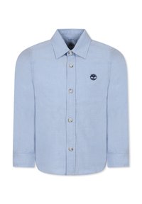 Chemise à manches longues bleu clair en coton, dotée d'un col boutonné, de boutons à l'avant et d'un petit logo brodé sur la poitrine.