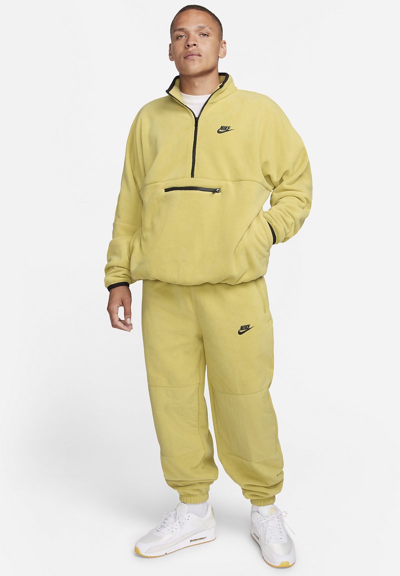 Nike Sportswear Trainingsbroek goudkleurig