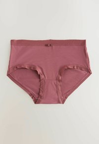 Culottes taille haute en coton couleur rose pour femmes, avec un petit nœud décoratif au centre de la ceinture, posées à plat sur un fond neutre.