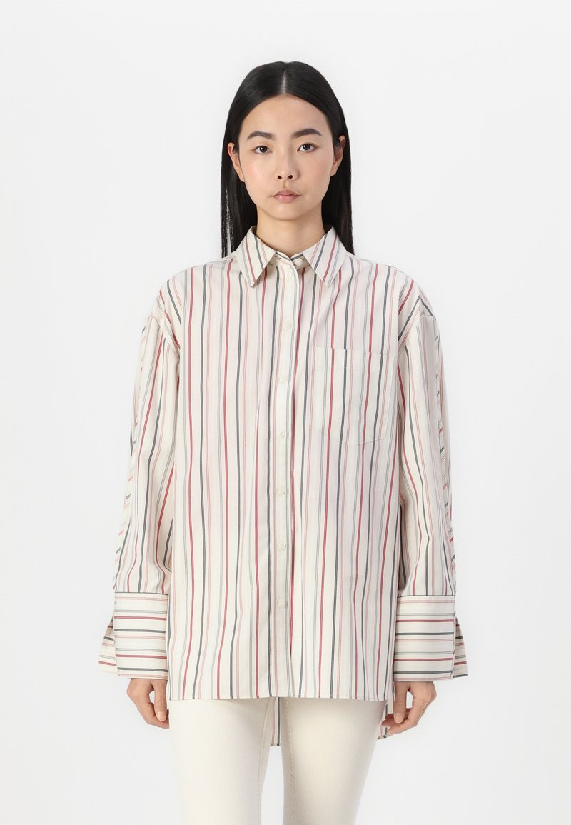 Collared button-up shirt in lightweight fabric, featuring vertical stripes in red, blue, and cream. Includes a chest pocket and wide sleeves.