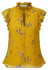 Blouse jaune sans manches avec petit imprimé floral, col à volants, décolleté en trou de serrure noué par un nœud, et manches bordées de volants.