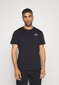 Under Armour LOGO HEAVYWEIGHT - Navadna majica - black/white