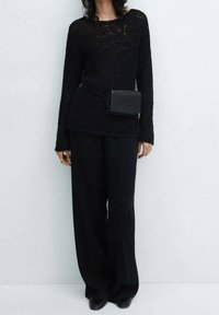 Mango Jersey de punto - black
