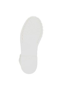 Suela de zapato de goma blanca con un patrón de banda texturizado, con un tacón ligeramente elevado y un diseño minimalista. Sin marcas ni acentos visibles.