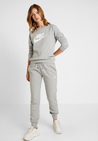 Nike Sportswear Treniņtērpa apakšdaļas - grey heather/white
