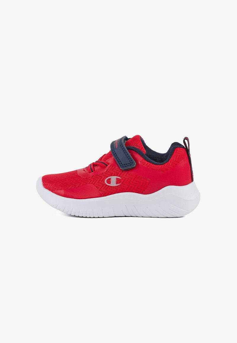 Red children's sneaker with mesh material, a Velcro strap, navy accents, and a white rubber sole featuring textured patterns.