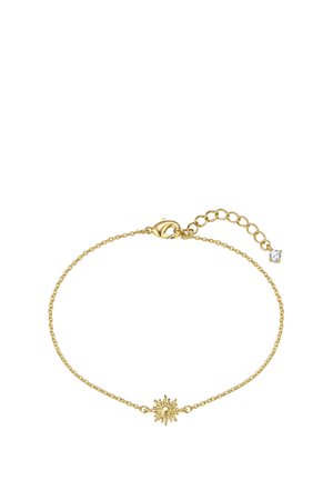 Pulsera delicada de cadena de oro con un colgante en forma de sol en el centro y un cierre ajustable con una pequeña piedra transparente.