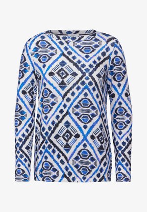 Langarmoberteil aus einem weißen Stoff mit einem blauen und schwarzen geometrischen Diamantenmuster, mit Rundhalsausschnitt und schmaler Passform.