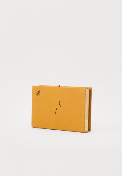 Yellow fabric wallet with a smooth texture, featuring a simple design and black bird print. Zipper closure along the top edge.