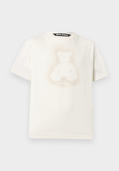 Λευκό κοντομάνικο μπλουζάκι με ξεθωριασμένη εικόνα αρκουδάκι και μαύρη ετικέτα "Palm Angels" στο εσωτερικό του γιακά.