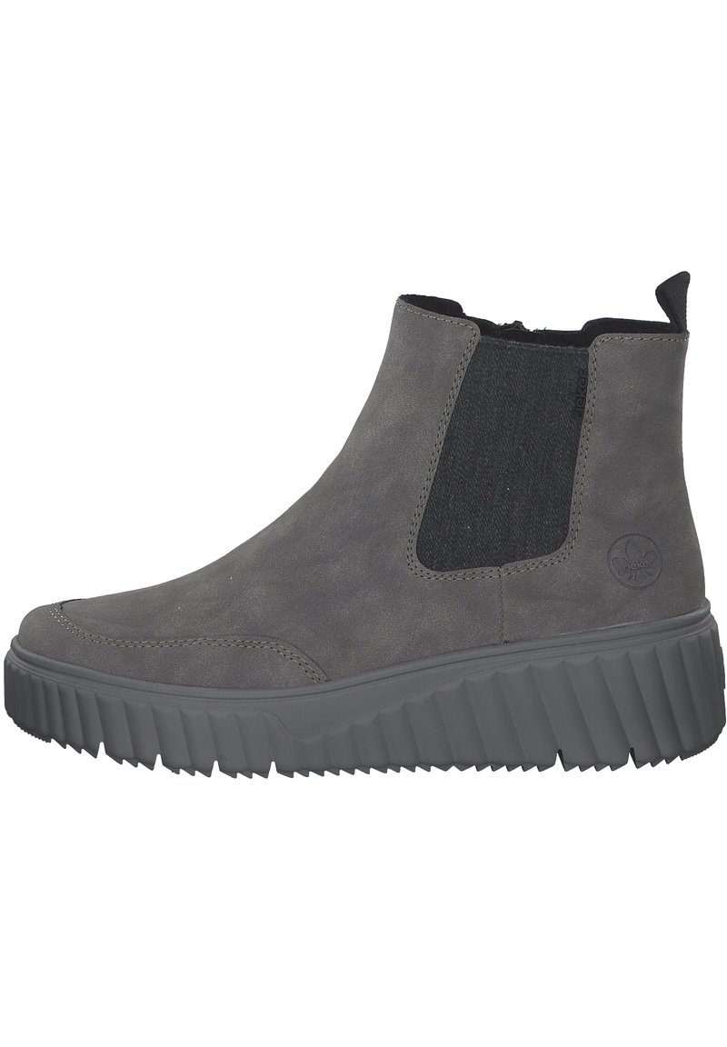 Bottine en suede grise avec panneaux élastiques sur les côtés, bout arrondi et semelle en caoutchouc texturé. Dotée d'une languette à l'arrière pour un enfilage facile.