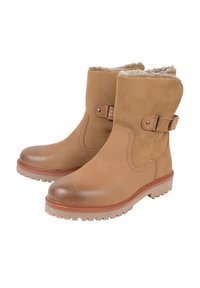 Beżowe botki do kostki wykonane z gładkiej skóry z miękką podszewką. Posiadają boczny pasek z klamrą oraz wytrzymałą gumową podeszwę.