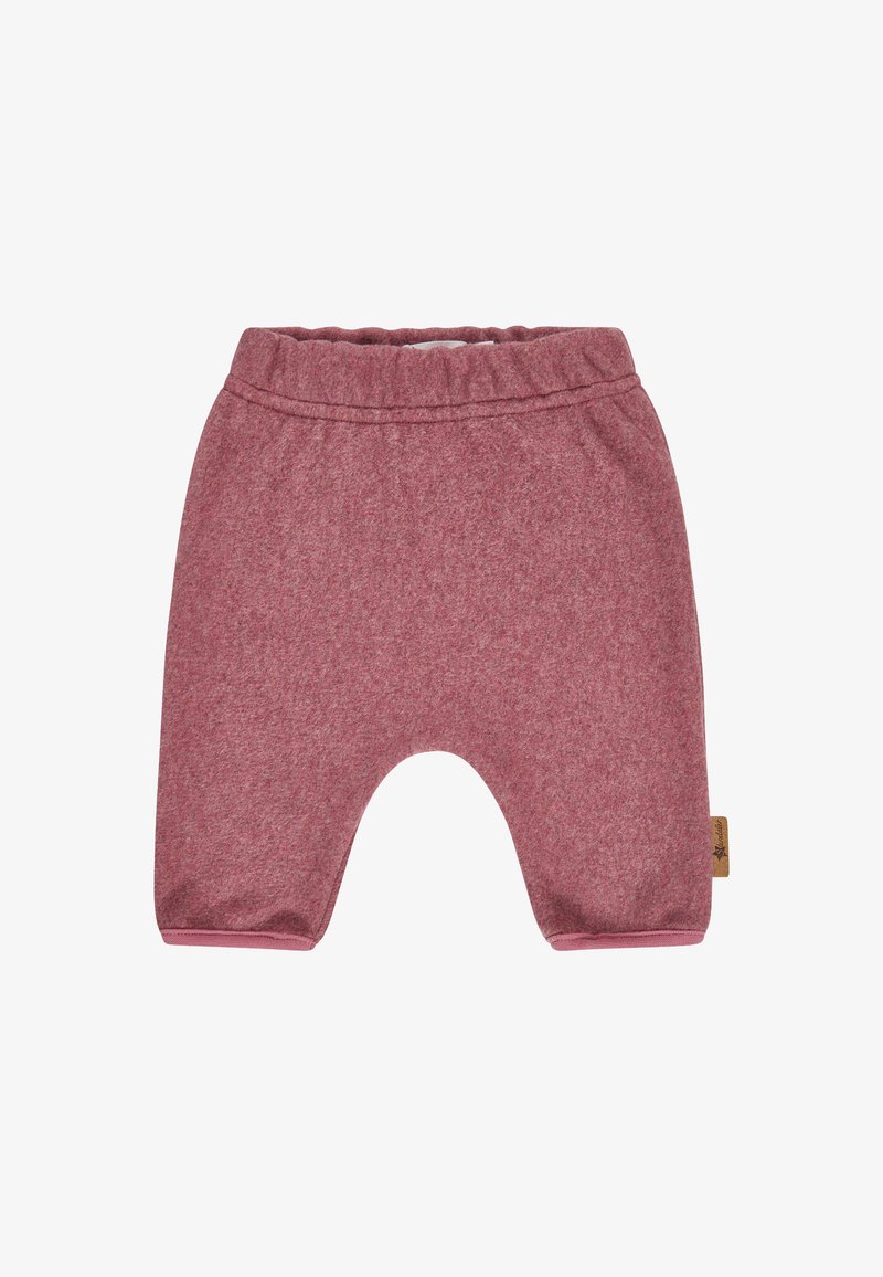 Soft pink toddler pants with elastic waistband and a small fabric brand tag on the right side.
