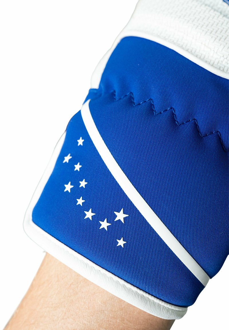 Blue textile glove with white accents and a pattern of small stars along the edge, featuring textured fabric and a snug fit.