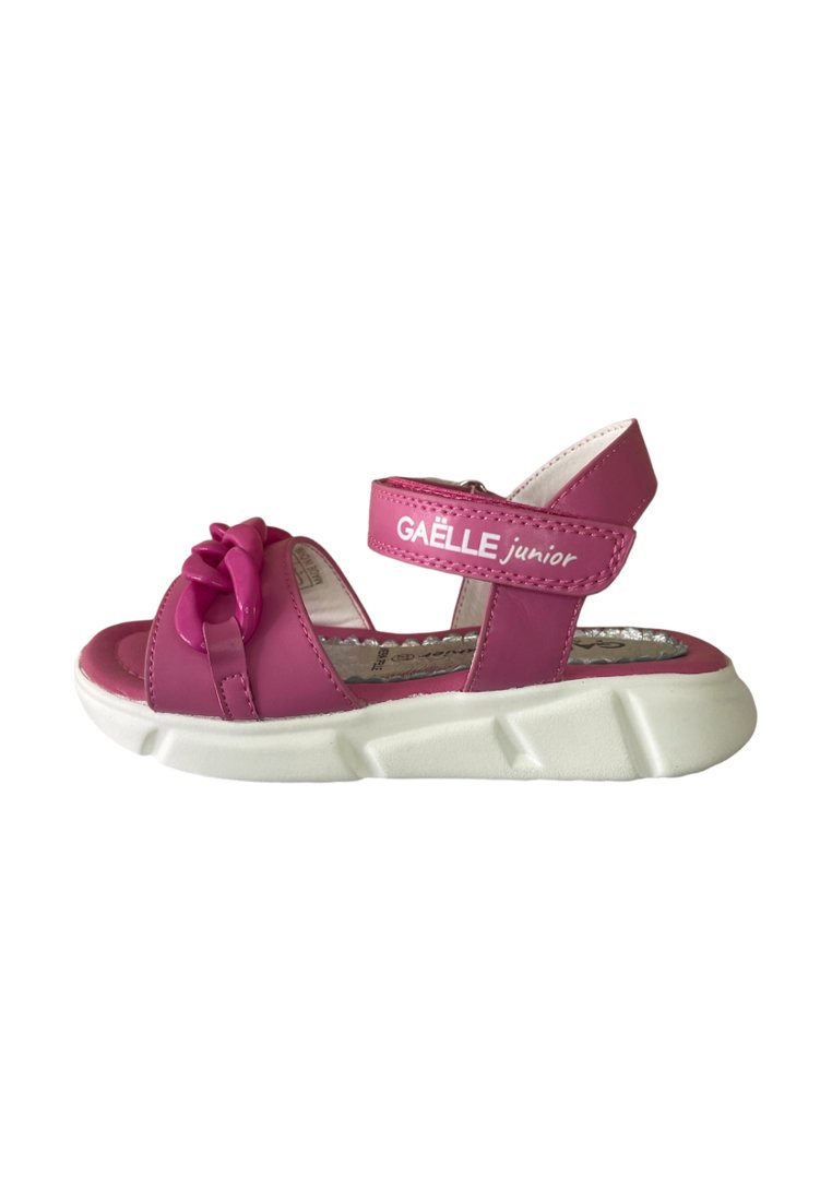 Sandaletti rosa con dettaglio a fiocco, parte superiore in sintetico, cinturino regolabile e suola in gomma bianca. Presenta il logo "GAËLLE junior" sul cinturino.