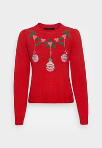 Pull en tricot rouge avec un col rond, des manches longues et des ornements de vacances brodés avec des feuilles vertes et des accents roses.