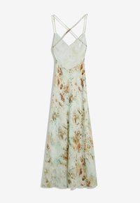 Maxime dress i lättviktsmaterial med ett grönt och brunt abstrakt mönster, djup V-ringning och korsade spaghettiband baktill.