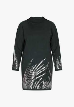 Donkergroene trui-jurk met een hoge halslijn en lange mouwen, versierd met zilveren pailletten in bladvorm op de onderste helft.