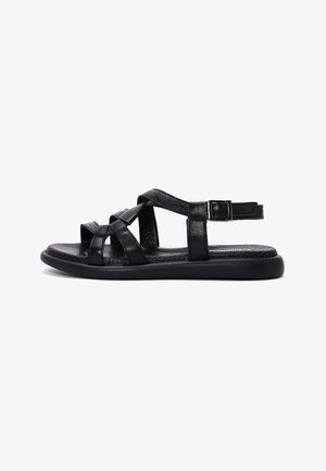 Black leather sandal with open toe, adjustable ankle strap with buckle, and cushioned sole with textured footbed.