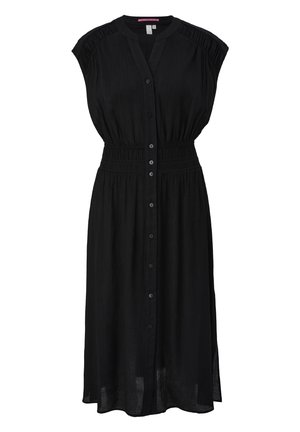 Robe noire à boutons avec des manches courtes, taille élastique et tissu texturé. Longueur complète avec une silhouette fluide et des accents plissés subtils.