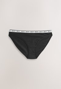 Slip en coton noir avec ceinture élastique blanche arborant le texte "NEXT". Texture lisse et forme classique, adapté pour un usage quotidien.