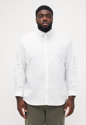 White long-sleeve button-up shirt with a collar, featuring a smooth texture and a straight cut. Buttons are light-colored, providing contrast.