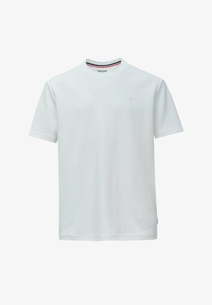 Maglietta bianca a maniche corte in cotone testurizzato. Caratterizzata da collo tondo con righe rosse e blu, e un piccolo logo sul petto.