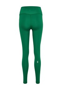 Zielone legginsy z wysokim stanem o gładkiej teksturze, z dopasowanym krojem i małym białym detalem w kształcie zygzaka przy kostce.