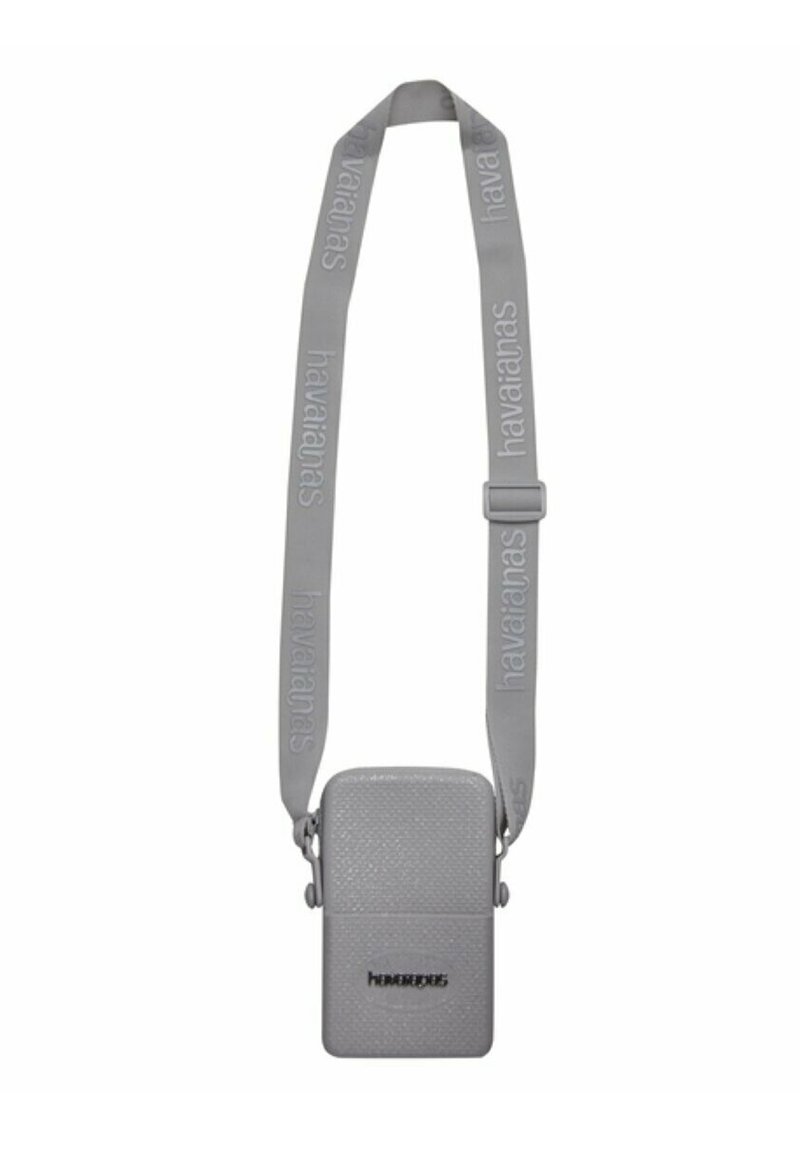 Borsa a tracolla grigia con superficie testurizzata, dotata di una tracolla con la scritta "havaianas". Design compatto con una chiusura sicura.