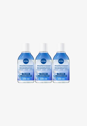 NIVEA Micellar Water Regeneration, 400 ml, clear bottles with blue liquid, white caps, labels in German detailing benefits for tired, sensitive skin.